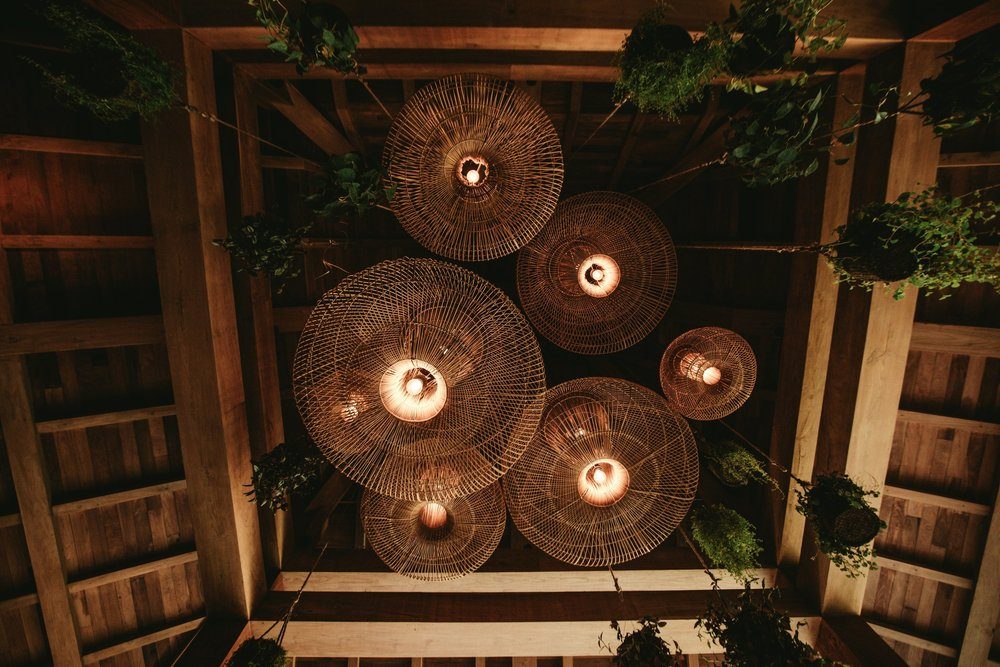 Dining table set beneath the joglo