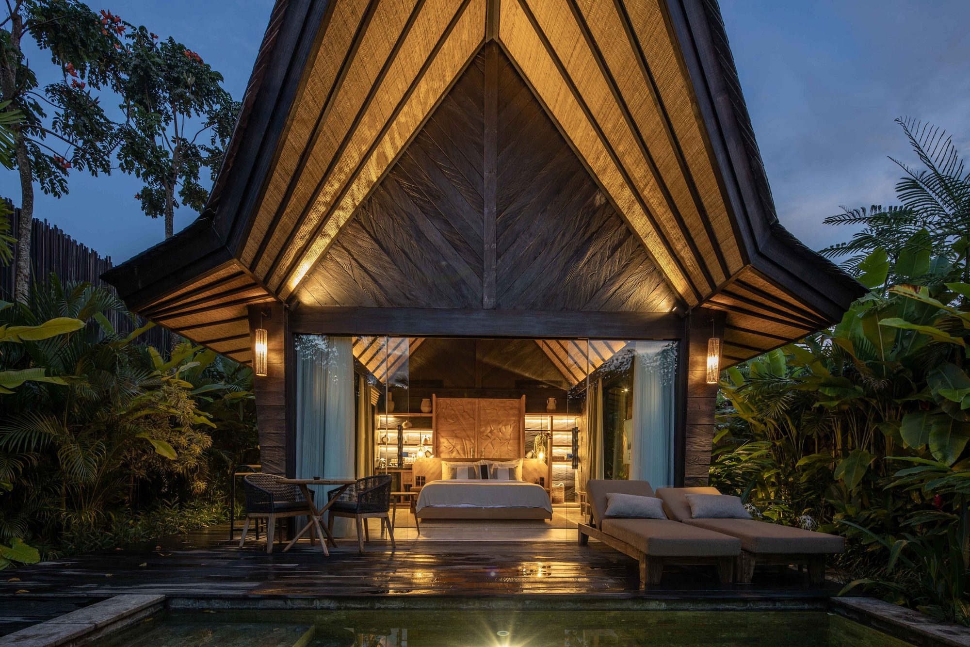 King-size bed and hand-crafted interiors in a Desa Hay villa