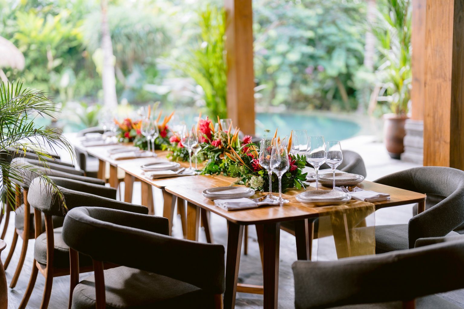 Wedding dinner set in the tropical gardens at Desa Hay