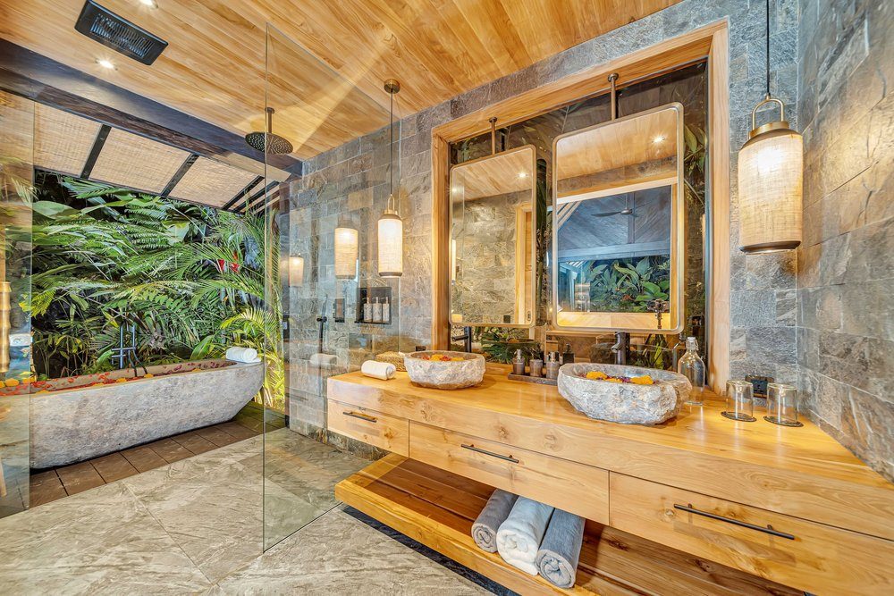 Outdoor stone bathtub in a villa garden